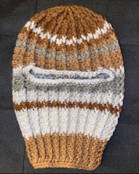 a knitted beanie with a striped pattern